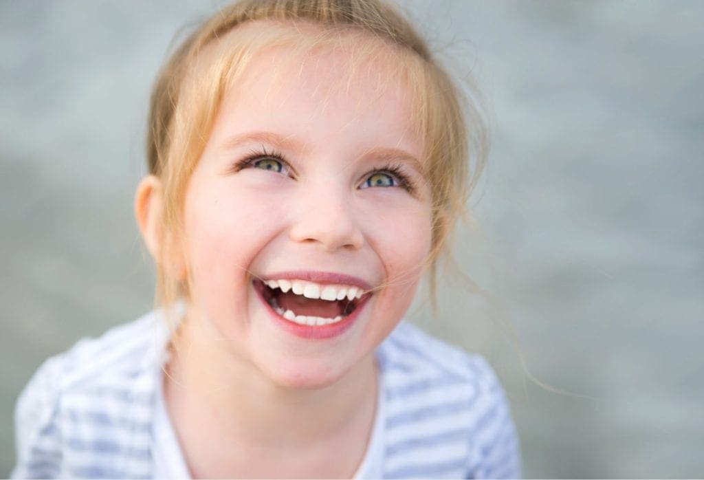 Young Blonde Girl Smiling