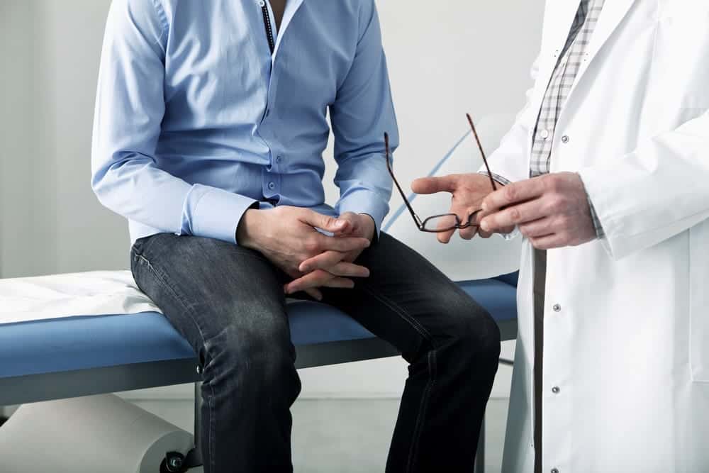 Man talking with his doctor
